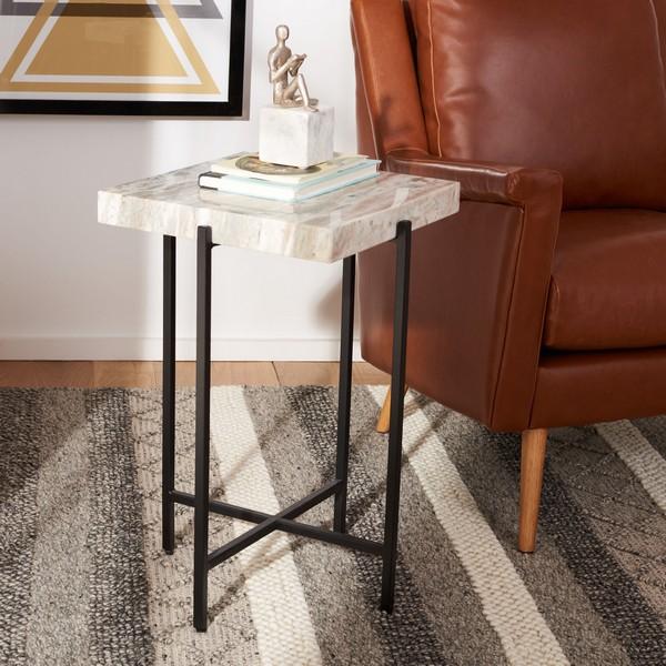This Accent Table’s sleek geometry and square marble top abounds with cool organic energy. Tenzin’s clean lined good looks...