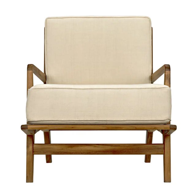 Comfort and style are synonymous in this striking armchair. 100% handcrafted, the frame is natural teak with mid-century...