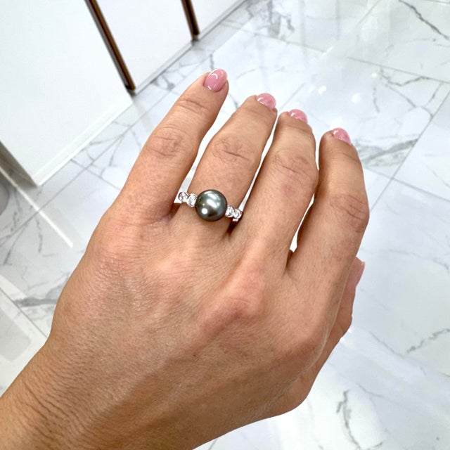 Brand: Mikimoto Gender: Ladies Metal Type: 18K White Gold Ring Size: 6.5 Weight: 5.00 grams One ladies 18K white gold...