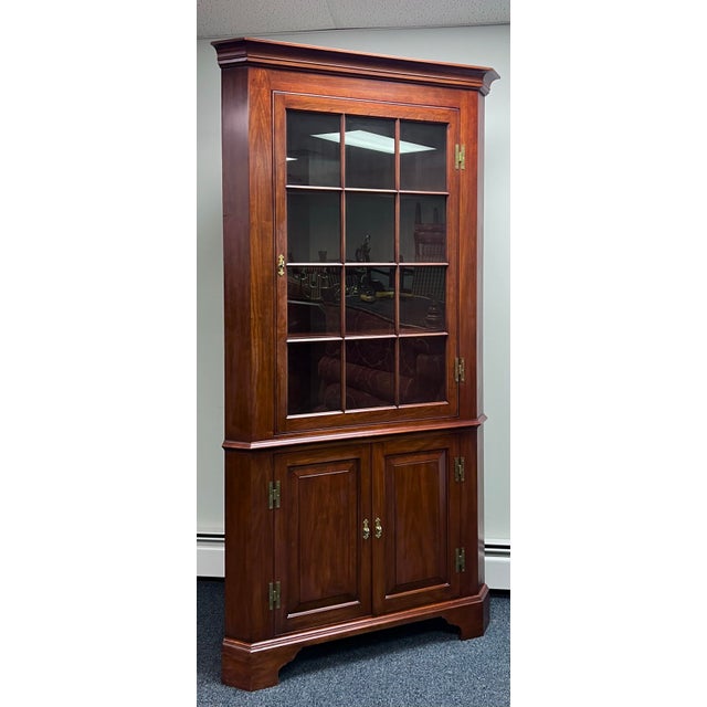 Henkel Harris 12 Pane wild black cherry Chippendale style corner cabinet. Model number 1114HL in finish code 24. Features...