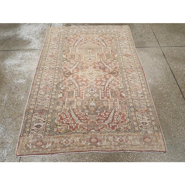 This Early 20th century Turkish Sivas rug, measuring 3' 11" x 5' 7", reflects the refined artistry and classical...