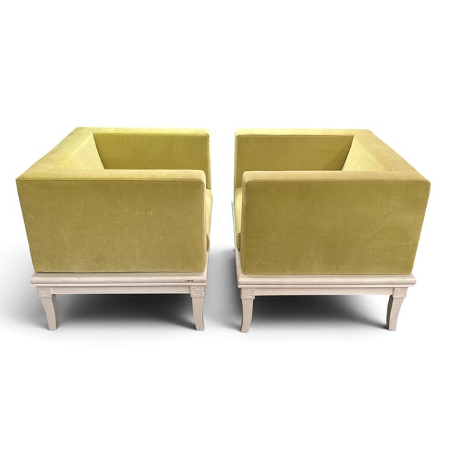 Pair of chartreuse green velvet chairs with wooden accents. These have been reupholstered and frames painted white- the...