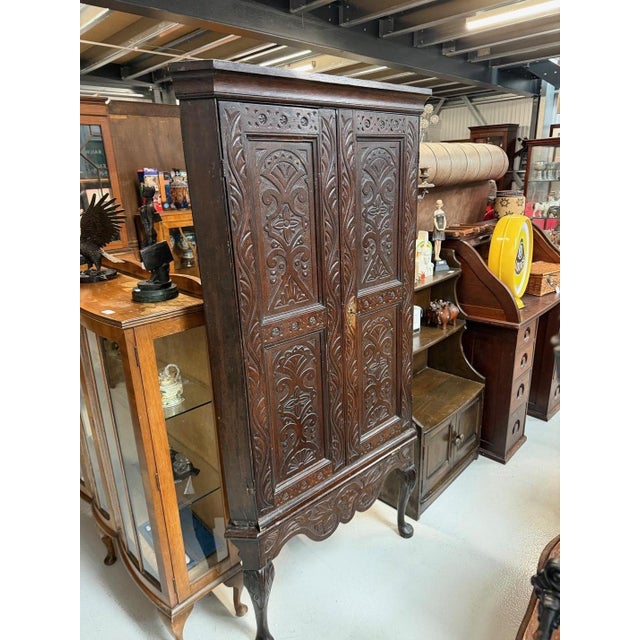Wood Antique Oak 2 Door Corner Unit With Carved Panels Resting On Cabriole Feet For Sale - Image 7 of 8