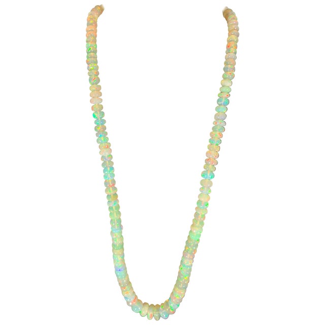 Natural Opal single strand Bead Necklace with 14 Karat gold Clasp. These are Ethiopian Beads 18.5" long 1 layers of...