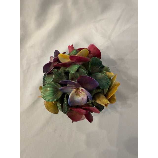 This beautiful vintage miniature floral posy showcases the delicate artistry of historic English potteries. The piece...