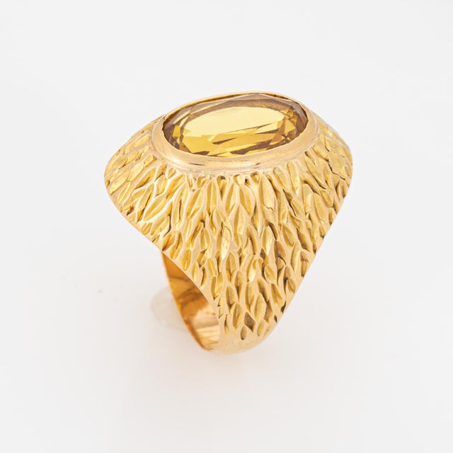 Stylish vintage citrine cocktail ring crafted in 19k yellow gold (circa 1960s). Crafted in Portuguese 19k yellow gold, the...