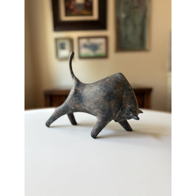 Mid-Century modern, brutalist-style cast iron Fighting Bull (Charging Bull) sculpture poised to make an impression....