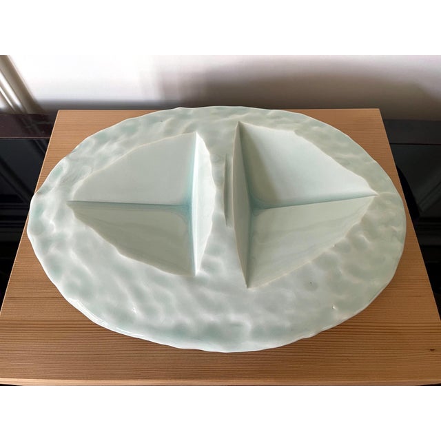 A richly glazed ceramic sculptural slab in the shape of a centerpiece plate by Japanese ceramic artist Yoshikawa Masamichi...