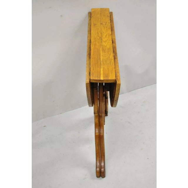 Antique Eastlake Victorian Folding Dropleaf Napkin Card Game Oak Dining Table. Item features drop leaf sides and folding...