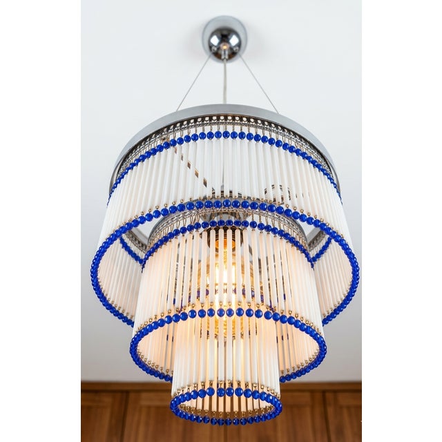 Beautiful vintage chandelier, created in 1962. Art Deco style, with a Middle Eastern touch. Created entirely by hand by...