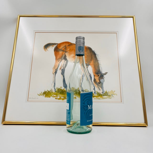 A charming and expressive original watercolor depicting a grazing horse, rendered in warm chestnut tones with loose, fluid...