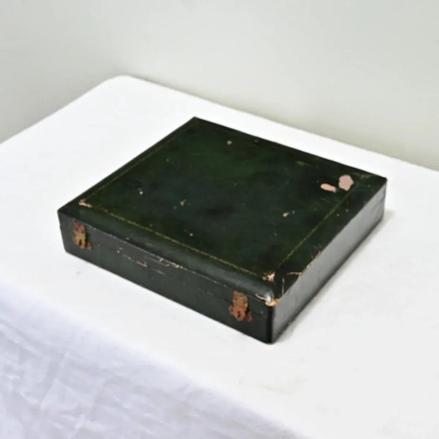 A French vintage set of twenty-four pieces of silverplated forks and spoons with an Art Deco styling, presented in a...