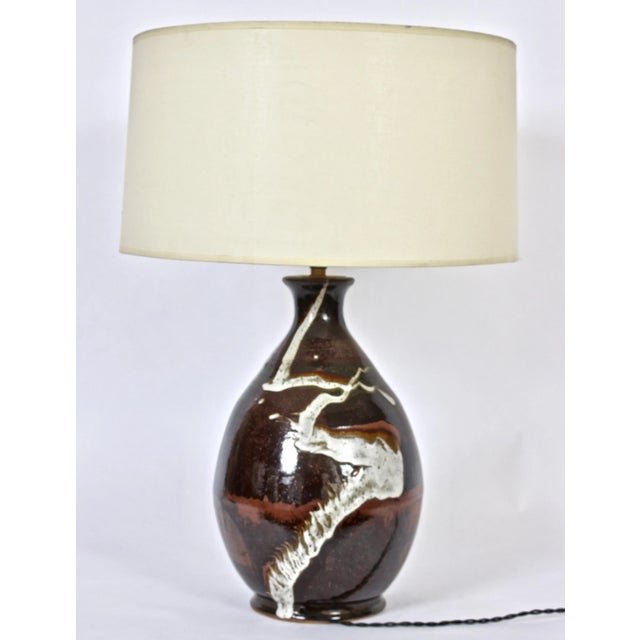 Organic Modern Far Eastern Influenced Glossy Glazed Art Pottery "Brush Stroke" Table Lamp, 1970's. Featuring a handcrafted...