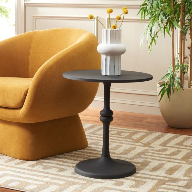Enrich your home with the classy and elegant appeal of our Ciri round accent table. Our table refines and updates a...