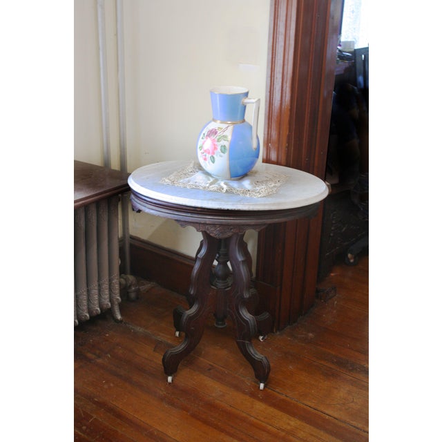 Late 19th Century Antique Victorian Marble Top Carved Base Oval Parlor Table For Sale - Image 5 of 9