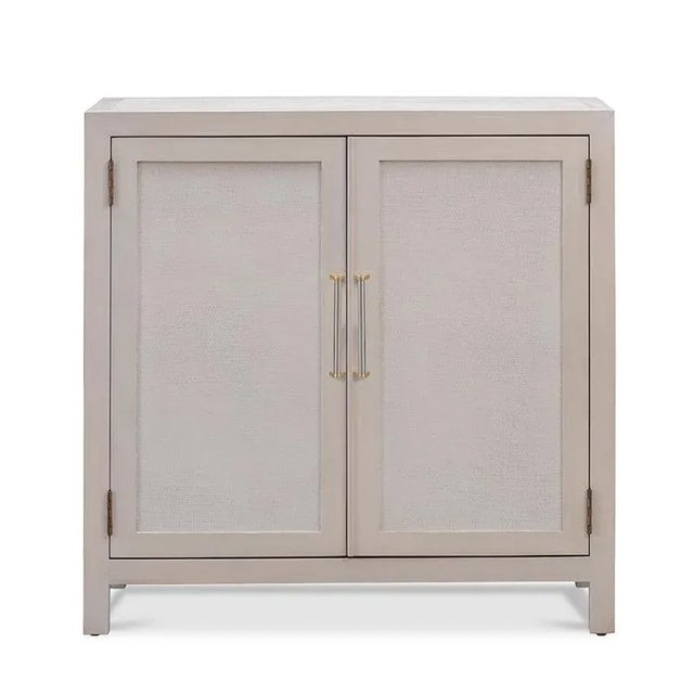Designed in the spirit of 16th Century Ming Dynasty originals. A rectangular framed top rests over a pair of doors that...