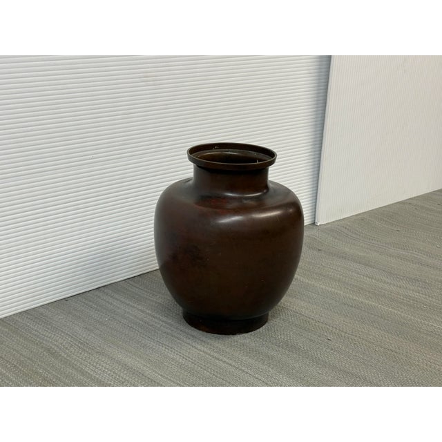 Design Plus Gallery presents a Signed Ceramic Vase from Oaxaca, Mexico. The vase has a rounded, bulbous body with a flared...
