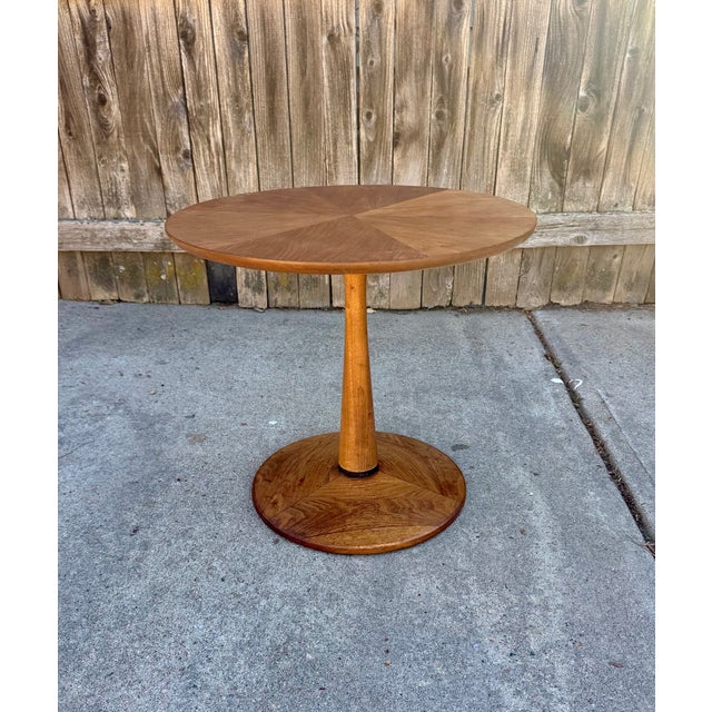 Drexel walnut side table with sunburst grain top from the Declaration collection designed by Stewart MacDougall and Kipp...