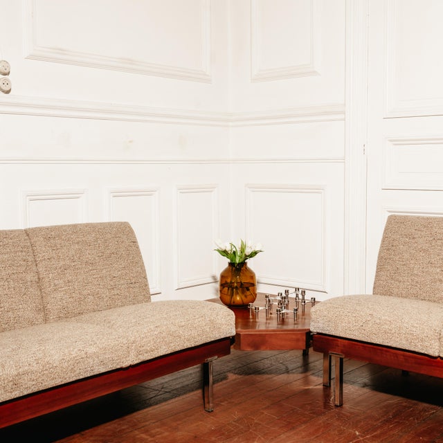 Living room set comprising a three-seater sofa, a two-seater sofa with an integrated side table, and a separate side table...