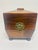 This is a mid 19th century handmade Rosewood tea caddy. The tea caddy has its original glass disposal bowl in the center...