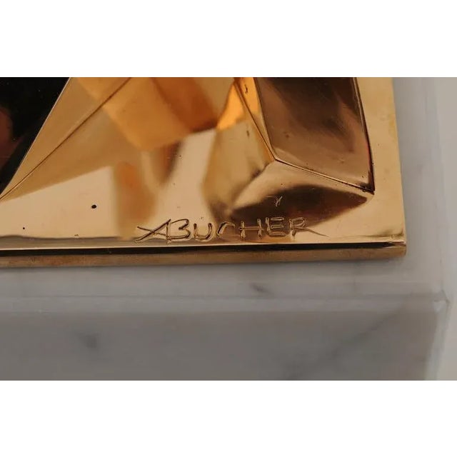The intersecting sculptural lines of this French signed vintage bronze sculpture by Boucher was professionally polished...