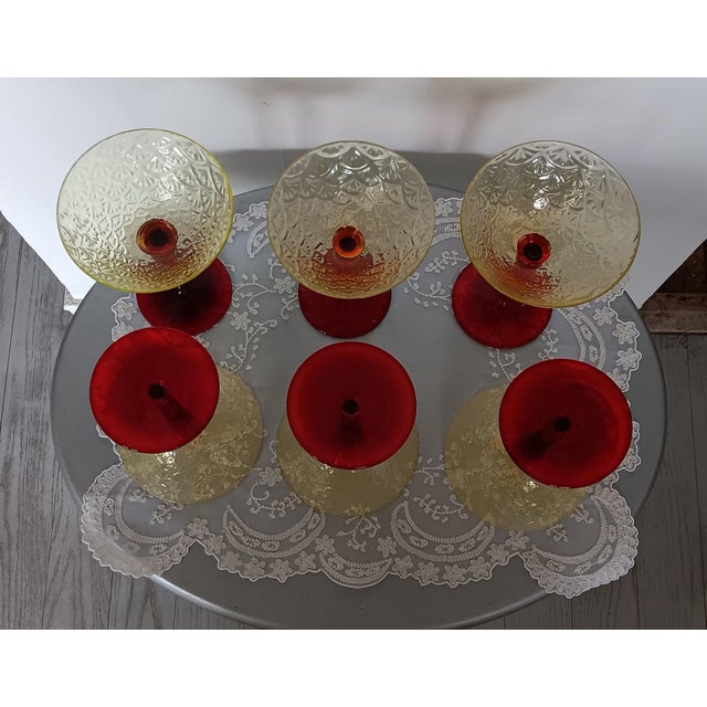 Vintage Pukeberg ruby coupe on a topaz stem champagne glasses. Turkey Tracks pattern Vaseline. Delicate fine rim.