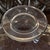 antique cut-glass or crystal perfume and cologne bottle featuring a starburst or hobstar-cut base and a round top with a...