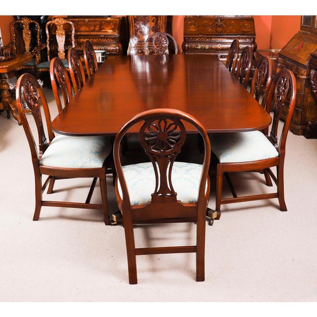 This is a fabulous Vintage dining set comprising a Regency Revival dining table by the master cabinet maker William...