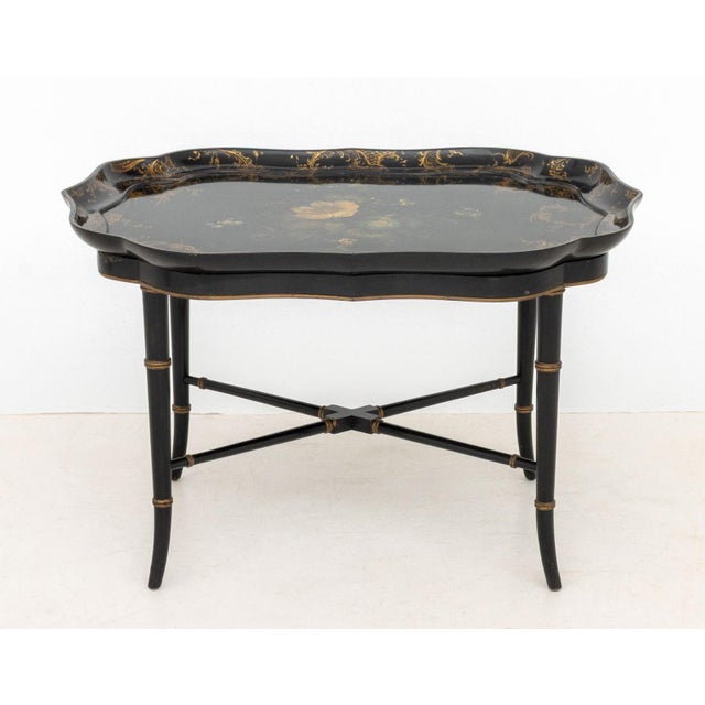 Regency Papier Mache Tray Top Table, circa 1820, top with floral design and ornate gold-tone designs, underside marked...