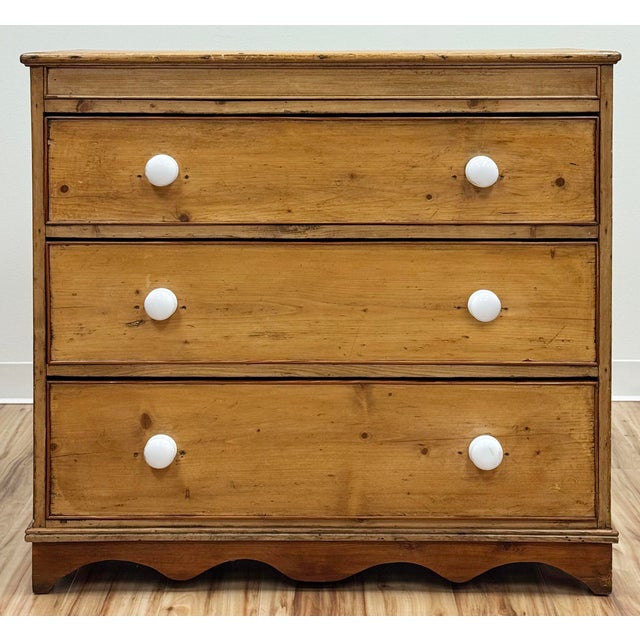 Beautiful antique English Country pine dresser. Lovely warm patina, scalloped apron, and smooth open and close dovetail...