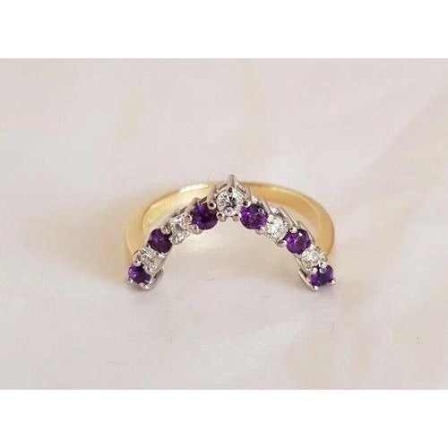 An elegant vintage british dress ring by h m, crafted in solid 18-carat yellow gold and set with brilliant-cut diamonds...