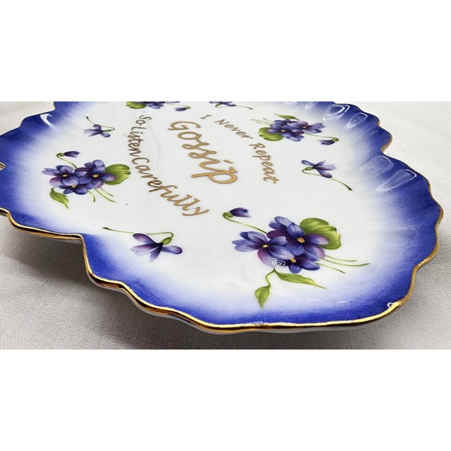This vintage porcelain scalloped plate has a clever, funny quote. It is edged in gilt gold with gold lettering and...