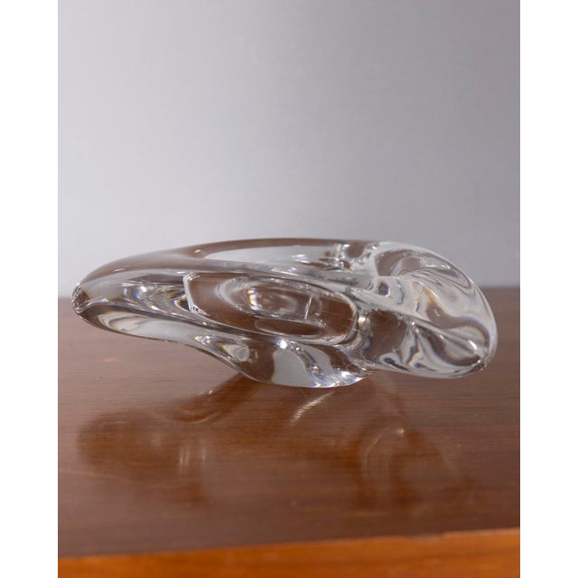 Triangular ashtray in clear crystal, with engraving on the bottom, Italian design, 1970s.