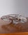 Triangular ashtray in clear crystal, with engraving on the bottom, Italian design, 1970s.