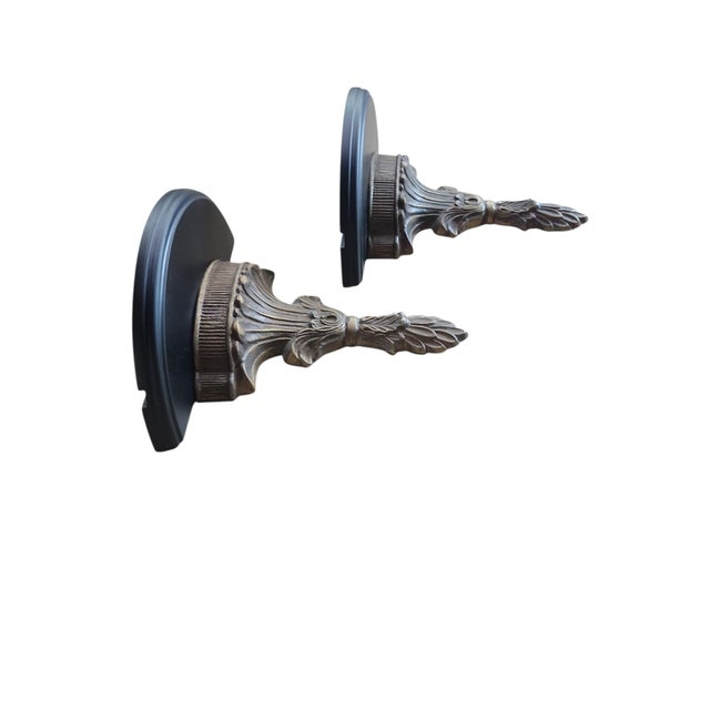 Beautiful pair of vintage Neoclassical style corbels, both in excellent condition. Brass and resin construction, grooved...