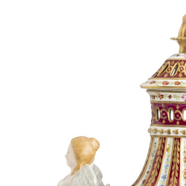 Porcelain - Perfume Bottle. French, molded and embossed porcelain, polychrome and gilded decoration depicting floral...