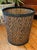 Vintage woven two-toned wastepaper basket. Features a natural weave with a dark forest green weave and edge. Most items...