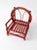 An antique Adirondack-style children’s chair with a folk art twig construction and a sculptural bentwood back. The red...