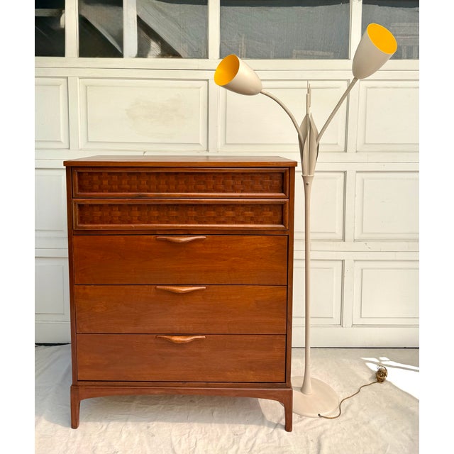 Here is a striking vintage mid-century modern floor lamp, likely dating to the 1960s–1970s, designed in the form of...