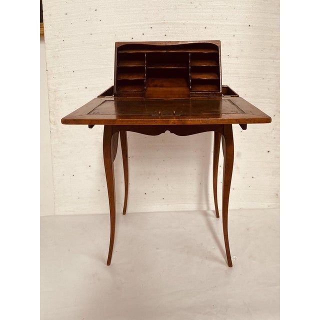 Louis xv style cherrywood capuchin desk (or tilting secretary desk) desk with a mechanism: the top folds down to reveal a...