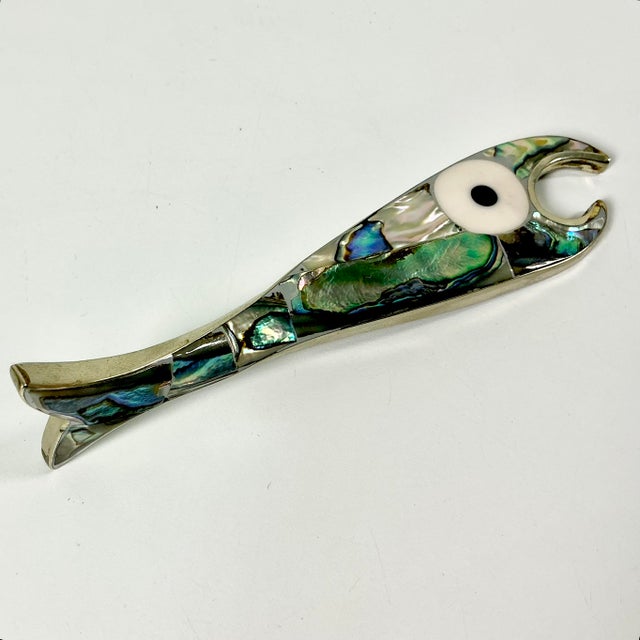Vintage Home is pleased to offer this vintage Bottle Opener from the 1970s. It features a fish shaped form crafted from...