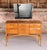 French Mid Century mahogany dressing table with a mirror, circa 1960s. 6 drawers with brass handles. Beautiful flamed...