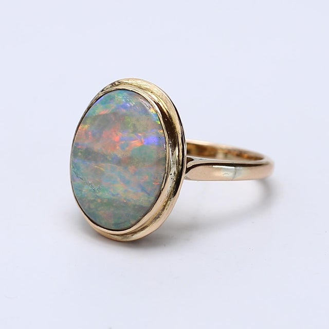 Late 20th Century 14k Yellow Gold Bezel-Set Oval Opal Cabochon Ring - Size 6 For Sale - Image 4 of 6