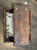 Antique rolling footstool with rare wheels.