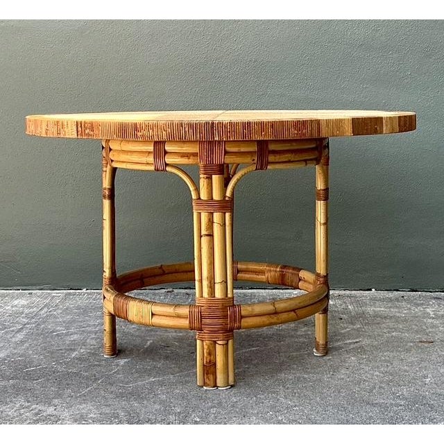 This exceptional dining table by the legendary Bielecky Brothers is a masterclass in organic texture and mid-century...
