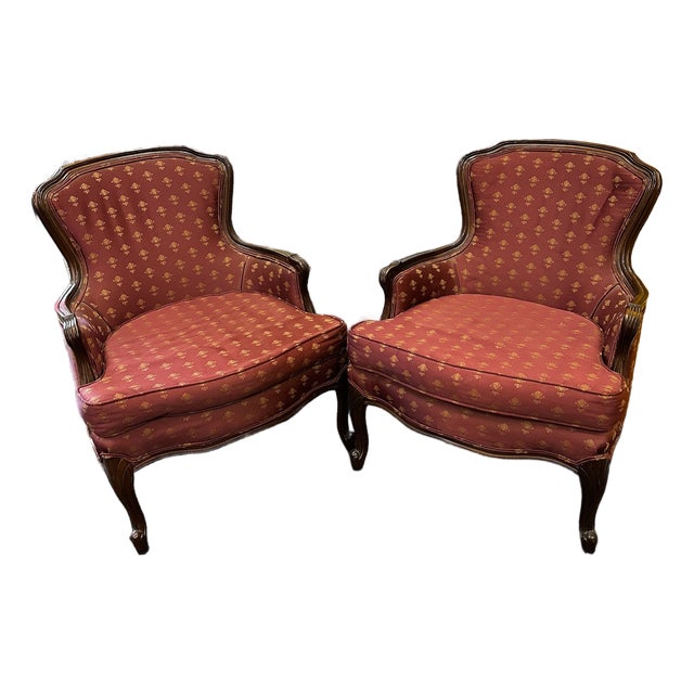 Pair of Antique Mahogany Bergere Chairs Upholstered in Burgundy and Gold Silk For Sale