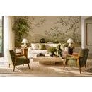 A rare pair of Brazilian Modern armchairs designed by Liceu de Artes e Ofícios, crafted in richly figured caviúna wood and...