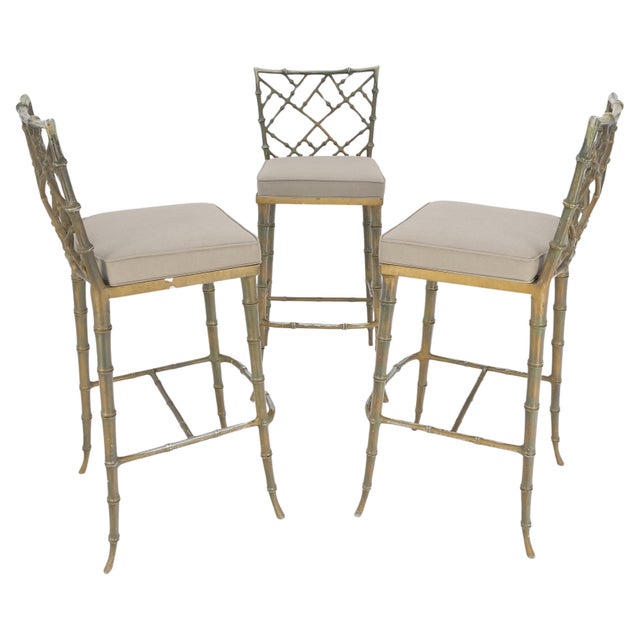 Cast Aluminum set of 3 Faux Bamboo Bar Stools New Alcantera Fabric Upholstery. Fine horn shape leg tips. The frames shows...