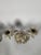 Pair of Rococo Style Silvered Bronze Candelabra, 19th Century. A pair of Rococo style candlesticks in chased and silvered...