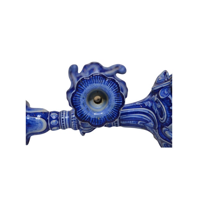 Beautiful art nouveau blue and white antique Portuguese candle sticks. Hand painted glazed earthenware that is signed and...